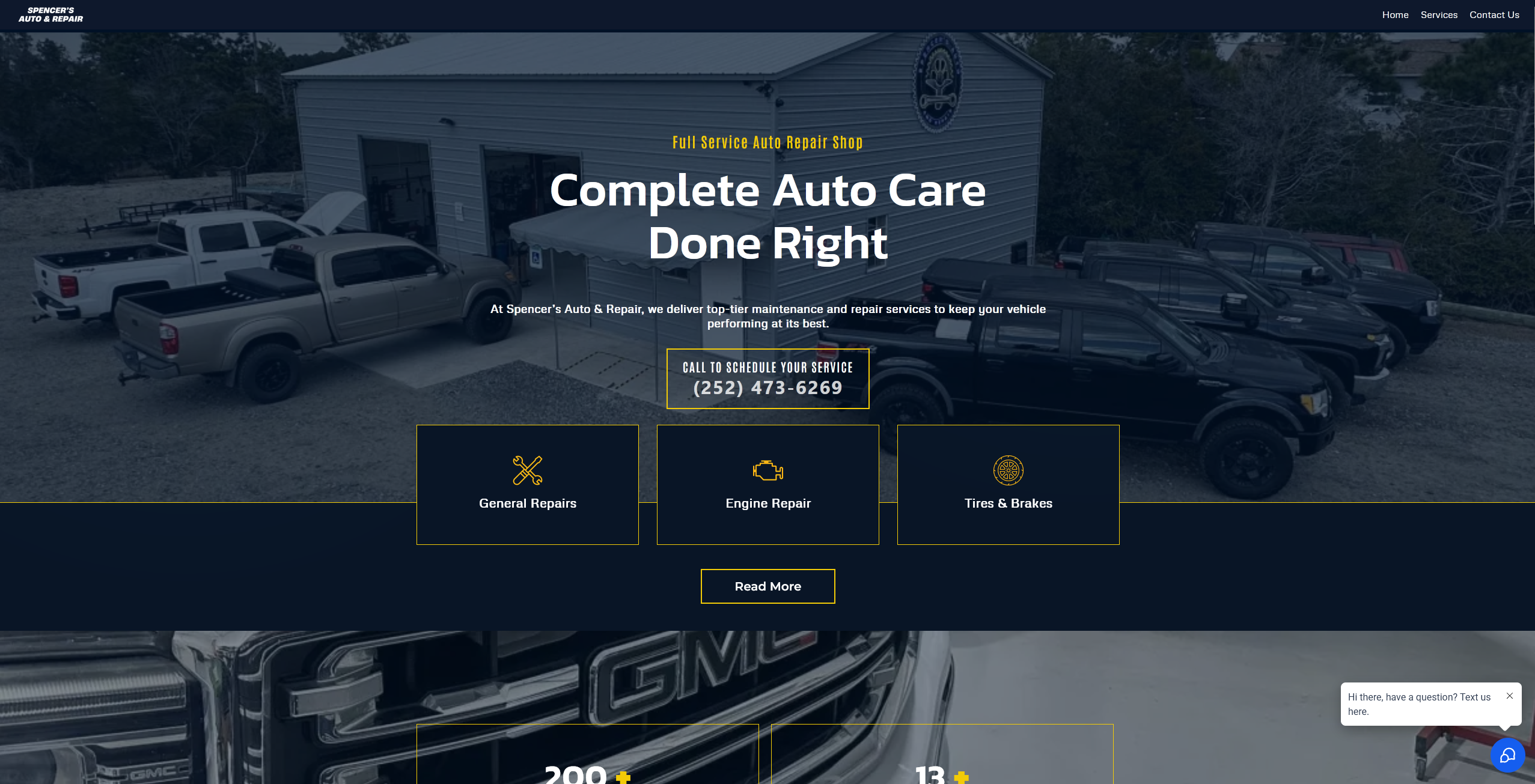 Homepage of Spencer’s Auto & Repair showcasing a garage with multiple pickup trucks and service categories like general repairs, engine repair, and tires & brakes. Built by Mobilis Media who provides web design for small businesses in lexington nc